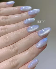 Ice Blue Cat Eye Nails, Icy Nails Winter Blue, Glittery Light Blue Nails, Holographic Blue Nails, Glass Blue Nails, Blue Pearlescent Nails, Blue Nails Shiny, Light Blue Glitter Nails, Blue Iridescent Nails