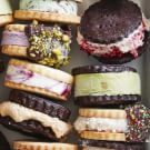 an assortment of ice cream sandwiches and pastries