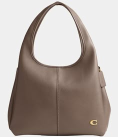 Shop for COACH Lana Pebbled Leather Shoulder Bag at Dillard's. Visit Dillard's to find clothing, accessories, shoes, cosmetics & more. The Style of Your Life. Medium Sized Bags, Polished Pebble, Coach Shoulder Bag, Large Shoulder Bags, Sleek Fashion, Leather Design, Coach Purses, Pebbled Leather, Shoulder Bag Women