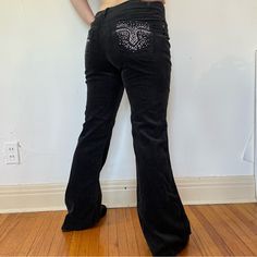 Y2k Lazer Corduroy Pants Nwt Early 2000s Black Corduroy Flare Pants By Lazer Jeans. Blingy Faux Pearl And Rhinestone Details On The Pockets And Belt Loops. Perfect For Styling A Mall Goth Or Mcbling Fit. The Corduroy Has A Very Short Pile, So The Texture Is Very Subtle And Velvety. New With Tags. But, Be Warned These Are Fuzz Attractors For Sure. The Fuzz These Collected From Storage Has Been Removed And Is Best Removed With A Lint Shaver. Tagged Size 9. Juniors Sizing. Shown On A Womens Size 6. Refer To Measurements. True To Size Imho. The Fabric Does Have Some Stretch. Measurements Waist: 32” Hips: 36” Rise: 8.5” Inseam: 32” #Mcbling #Mallgoth #Numetal #Gyaru Lint Shaver, Corduroy Flare Pants, Jeans Y2k, Mall Goth, Early 2000s, Corduroy Pants, Jeans Black, Flare Pants