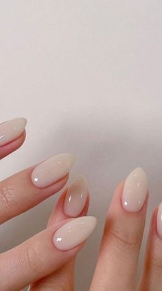 Imagine: A natural yet stylish look that complements your overall aesthetic. That's what you get with the milky white nail trend! This subtle, yet versatile, Milky White Nail, Nail Trend, Blush Nails, Nails Polish, White Nail, Almond Shaped, Neutral Nails