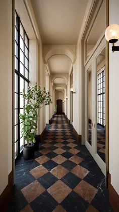 a long hallway with black and white checkered flooring, potted plant on the far end