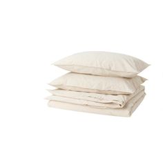 three pillows stacked on top of each other