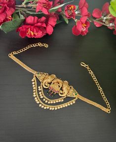 This Bajuband is a type of bracelet for upper arm to give a complete look to your weddings or Parties. The length is shown in one of the pictures. Please take a look. Elegant Ceremonial Bracelets With Latkans, Gold Bracelets With Latkans For Wedding, Gold Wedding Bracelets With Latkans, Elegant Gold Tikka For Marriage, Temple Jewelry Bracelets For Marriage, Armlet Gold, Indian Bridal Jewelry, Mangalsutra Design, Black Beads Mangalsutra