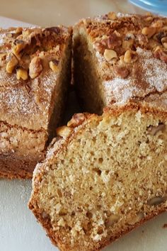 a sliced loaf of cake sitting on top of a cutting board