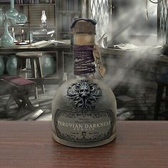 the bottle is sitting on the table with steam coming out of it's top