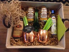 an open gift box filled with liquor and beer