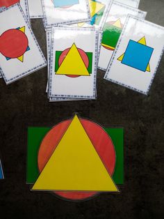 several pieces of paper with different shapes on them