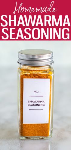 a jar filled with homemade shawarmma seasoning sitting on top of a counter