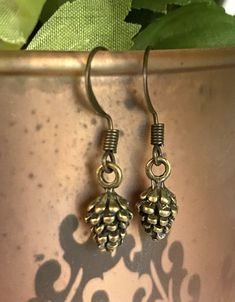 Pinecone Earrings Pinecone Earrings, Store Image, Earrings Antique, Brass Charms, Special Jewelry, Antique Earrings, Copper Earrings, Model Photography, Pine Cones