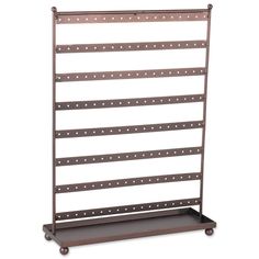 a metal rack with five shelves on wheels