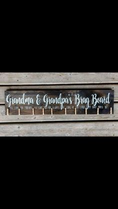 a wooden sign that says grandma and grandpa's big board