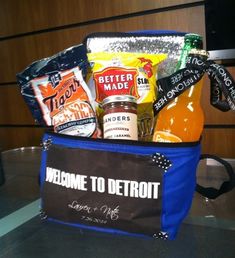 the welcome to detroit bag is filled with beer, snacks, and condiments