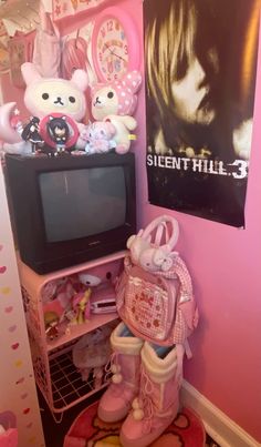 a pink room with stuffed animals and a television on top of a stand in the corner