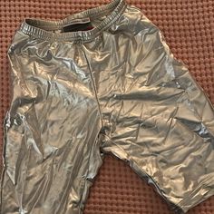 New With Tags Silver Urban Outfitters Biker Shorts Size Xs Tp Metallic Stretch Pants For Summer, Streetwear Bottoms With Built-in Shorts, Mid-thigh Length, Fitted Streetwear Bottoms In Short Style, Fitted Shorts For Streetwear, Sporty Metallic Fitted Bottoms, Fitted Short Bottoms For Streetwear, Short Workout Pants For Summer, Summer Workout Short Pants, Stretch Streetwear Shorts