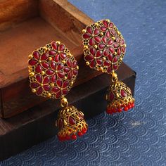 Overview These stylish Jhumki Earrings set from JewelryTrack will certainly leave you spellbound. These Jhumki Earrings set have an excellent finish and gives out an exquisite sense of style. If you are looking for an amazing Fashion Jewelry set for special occasions such as Anniversary, Engagement, Party, Wedding or for gifting , then your search ends here. Item Description: The look is stunning and preciously suitable for all kinds of dressy occasions. Metal: Brass OCCASION: PARTY WEAR , WEDDI Red Earrings For Puja And Festivals, Red Temple Jewelry Jhumkas For Puja, Red Temple Jewelry Jhumkas For Celebration, Red Temple Jewelry Jhumkas For Festivals, Red Earrings For Puja And Diwali, Red Cutdana Earrings For Puja, Red Jhumkas With Latkans For Puja, Red Latkans Jhumkas For Puja, Festival Celebration Jhumkas Drop Earrings