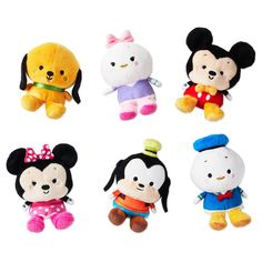 four stuffed animals are shown in different colors and sizes, including mickey mouse, pluto the dog