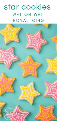 star cookies with pink and yellow icing on a blue background