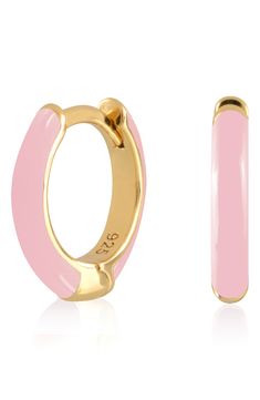 Easy-to-wear hoop earrings will add significant polish to even your most casual ensembles. 1/2" drop; 1/8" width Hinge with snap-post closure Sterling silver with goldtone plate/enamel Imported Pink Enamel Hoop Jewelry, Enamel Huggie Earrings Perfect For Gifts, Pink Enamel Hoop Earrings, Trendy Enamel Hoop Jewelry, Trendy Gold Enamel Hoop Earrings, Gold Enamel Huggie Earrings, Trendy Enamel Huggie Earrings, Nickel-free Enamel Hoop Earrings, Gold Enamel Hoop Huggie Earrings