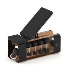 an exercise bench with six dumbs in it