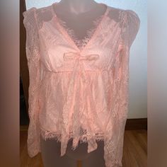 Women's Size Xs!! New With Tags Baby Pink/Lace! This Comes From A Pet Friendly/Pet Loving Home Fyi. Photos Are Taken With & Without Flash! I Have Many More Items For Sale On My Page! Fyi - Non-Serious Inquiries & Unreasonable Offers Will Be Permanently Blocked! Cute V-neck Party Top, Pink Long Sleeve Lace Top For Spring, Pink Lace Top With Ruffles For Spring, Pink Lace Top For Spring Party, Pink Lace Trim Top For Party, Chic Pink Lace Blouse, Pink Lace Blouse With Ruffles, Cute Party Tops With Lace Trim, Cute Lace Party Tops