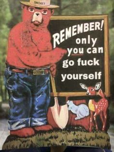 a teddy bear holding a shovel next to a sign that says, remember only you can go fock yourself