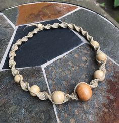 "Please read below for sizing and item details.  Note that these pieces are sized by the inner FIT not length. To ensure a proper fit always measure yourself either around the wrist/neck/ankle.  Natural hemp can be scratchy and fibrous when new, as you wear your jewelry it will soften over time. Always remove before bathing or swimming to increase longevity of your jewelry.  Beaded hemp necklace.  Fit - 16\" Width - 1/2\" Style - spiral Hemp strands- 2mm natural  Embellishments - wooden beads  C Cowrie Shell Necklace, Jewelry Hippie, Hemp Jewelry, Hemp Necklace, Hemp Bracelets, Dragonfly Jewelry, Button Bracelet, Hippie Bracelets, Jewelry Summer