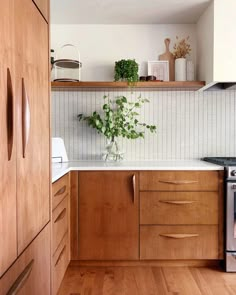 the instagram page shows an image of a kitchen with wooden cabinets