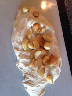 a piece of bread with nuts on it