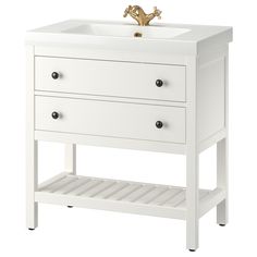 a white sink sitting next to a wooden stand with drawers on it's sides