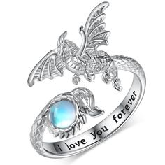 PRICES MAY VARY. Dragon Ring for Women: This Moonstone Dragon Ring is inspired by a dragon, which symbolizes strength, good luck and protection. Moonstone represents the lover's stone, and treat it as a token of beautiful love. Perfect earrings for daily wear, designed specifically for those who love dragon. Sterling Silver Dragon Rings Material: The Adjustable Dragon Ring is made of 925 sterling silver. Lead-free and nickel-free, Hypoallergenic and safety for sensitive skins women. Moonstone Dr Claughdaugh Ring, Dragon Ring Women, Dragon Wedding Rings, Fantasy Jewelry Ring, Dragon Wedding Ring, Spinning Rings Woman, Moonstone Dragon, Dragon Goddess, Fantasy Rings