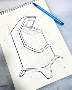 a drawing of a toaster sitting on top of a table next to a blue pencil