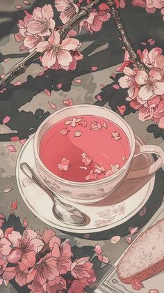 a tea cup and saucer on a table with pink flowers