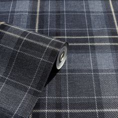 a close up view of a blue and white plaid fabric