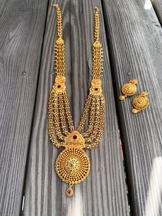 Chandra Haar Mala Gold plated mala. Traditional Haar Mala with layered chain design. Best for brides and suited to wear on saree, lehenga, kurta or any traditional dress. Bollywood Style Necklaces With Latkans For Puja, Elegant Kundan Necklace With Pallu For Rituals, Elegant Chain Necklace For Wedding And Festivals, Gold Temple Jewelry Chain Necklace For Wedding, Temple Jewelry Style Bridal Long Necklace, Intricate Bridal Necklace For Navratri Festivities, Traditional Gold Wedding Chain Necklace, Wedding Long Temple Necklace With Tilla, Navratri Bridal Necklace With Latkans For Puja