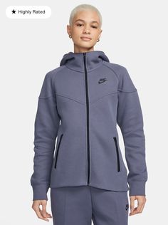 Elevate your sportswear game with this Nike Tech Windrunner Full Zip Hoodie and Pants set. The high neck, solid gray fleece fabric, and full zip closure offer both style and functionality, while the Nike logo accents add a touch of branding. The long sleeve hoodie with a hood is perfect for all seasons, from winter to summer, and can be worn for various sports and activities, from golf to basketball to bodybuilding. The cotton blend material is machine washable for easy care and maintenance. This unisex adults' athletic hoodie and pants set is perfect for those who appreciate both performance and style. Nike Windrunner, Nike Sportswear Tech Fleece, Nike Tech Fleece, Nike Tech, Tech Fleece, Carbon Black, Grey Nikes, Nike Hoodie, Sportswear Women