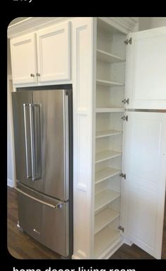 a refrigerator and pantry in a kitchen with white cabinets