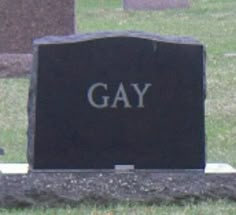 a headstone with the word gay on it