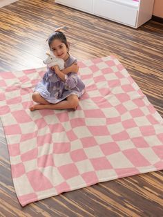 "Created to be as soft as possible, this micro-fleece minky blanket is made with 100% fluffy polyester. It comes in multiple sizes so anyone can enjoy it--toddlers, grown-ups, even your four-legged best friends. These blankets are knitted with ultra-fine microfiber yarns for a luxurious soft feel. » 100% Polyester. This extremely strong and durable synthetic fabric retains its shape and dries quickly. » Soft and plush material. A plush material that makes it fluffier and soft to the touch. » The Checkered Blanket, Home Decor Pink, Pink Checkered, Pink Blanket, Pink Home Decor, December 2024, Minky Blanket, Blanket Gift, Christmas Delivery