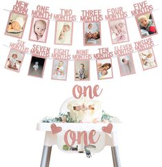 a baby's first birthday cake with photos hanging from the top and one word above it