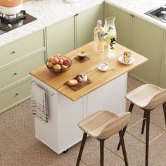 a kitchen island with two stools next to it