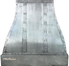 the back side of an oven hood with rivets on it