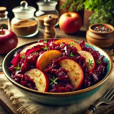 apples and cranberry sauce in a bowl on a table with other food items