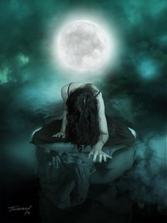 a woman sitting on top of a rock in front of a full moon and clouds