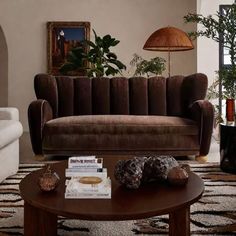 a living room with two couches and a coffee table