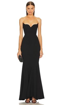 Find MICHAEL COSTELLO X Billie Gown on Editorialist. Michael Costello x REVOLVE Billie Gown in Black. - size M (also in XXS) Michael Costello x REVOLVE Billie Gown in Black. - size M (also in XXS) Elevate your style at any black-tie event with the Michael Costello x REVOLVE Black Billie Gown. With a chic bustier, flowing maxi length, and a ball gown silhouette, you'll be the epitome of elegance and sophistication.. Self: 63% rayon 33% nylon 4% spandex Lining: 97% cotton 3% spandex. Made in China Gala Dress Long, Black Tie Bridesmaid Dresses, Black Gala Dress, Black Tie Bridesmaids, Black Tie Wedding Guest Dress, Cutout Gown, Black Tie Formal, Black Tie Party, Michael Costello