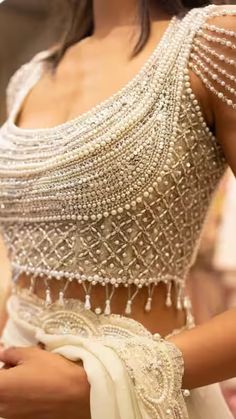 9 Unique Lehenga Blouse Designs to Try for Wedding Occasions in 2024 Lengha Blouse Designs, Latest Blouse Designs Pattern, Traditional Blouse Designs, Latest Model Blouse Designs, Lehenga Blouse Designs, Fashionable Saree Blouse Designs, Wedding Blouse Designs, Blouse Designs Indian