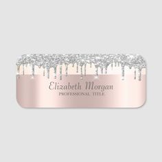 a pink and silver business card with the name elizabeth morgan professional title in white glitter