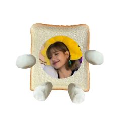 a toasted piece of bread with an image of a woman in a yellow hat