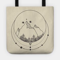 a tote bag with mountains and stars on it